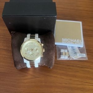 MK gold and white watch. Gently used.